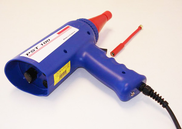 Electric spark leak detector